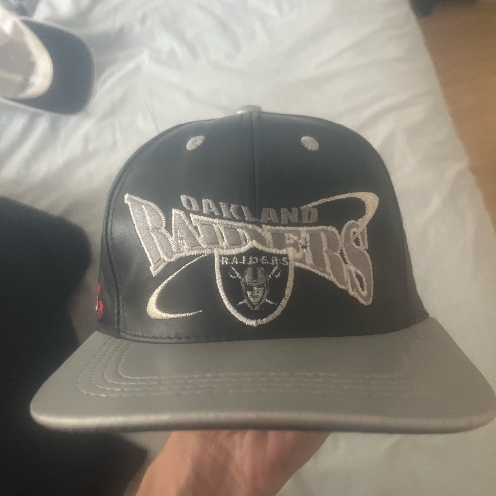 Vintage NFL Oakland Raiders Black and Gray Hat with Red Star Detail